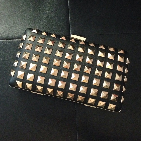 Gold studded clutch