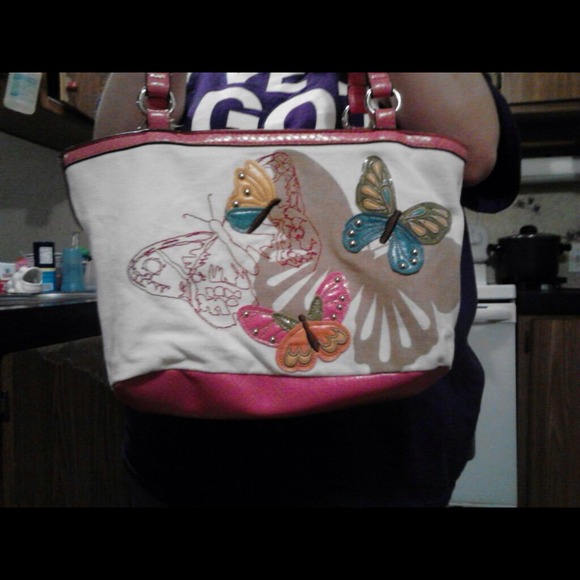 It is a cute strada butterfly purse.