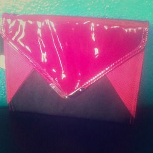 Hot pink and black Reaction hand clutch