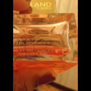 Michael kors, naked lipgloss and hair spray bundle