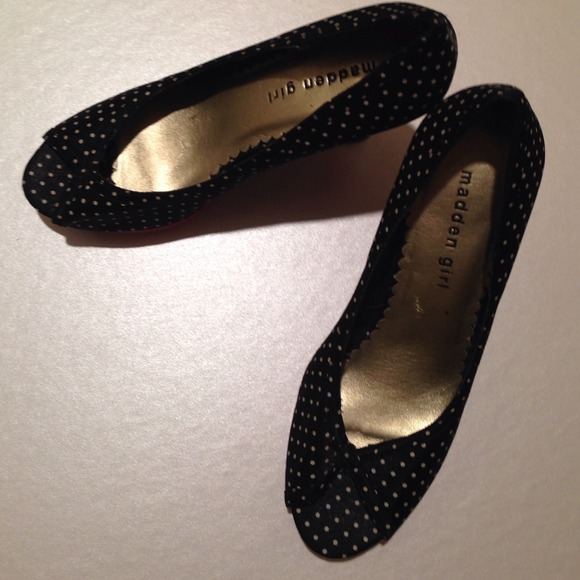 Black polka dot heels with red patent heel