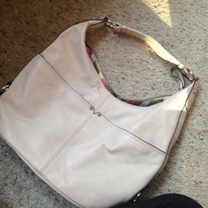 A beautiful cream hand bag