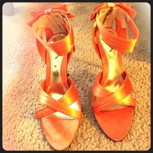 Orange satin pumps