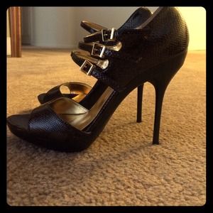 Brown snakeskin pumps