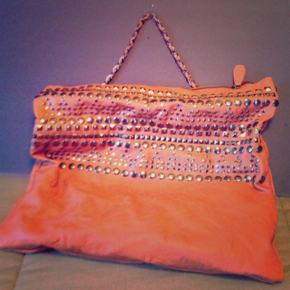 Orange studded hobo bag