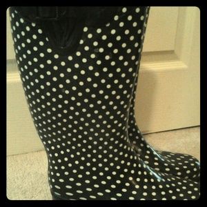 Black and white polka dot rain boots