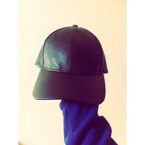 Black Faux leather cap.