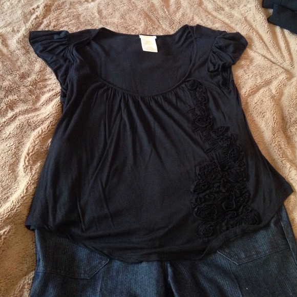 Large black top. Dressy or casual. It's up to you.