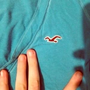 Small turquoise v-neck Hollister top