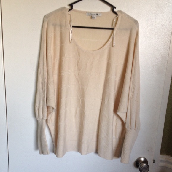Cream bat winged oversized top