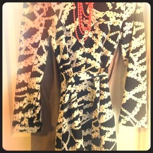 Apostrophe knee length jacket