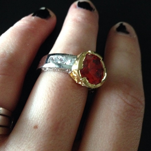 Silver ring with ruby