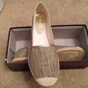 Tan and gold lined flats