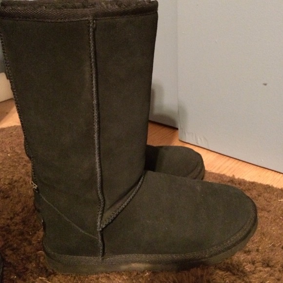 Tall black UGG boots