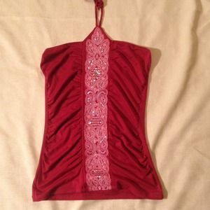 A wine colored,sparkly sleeveless top!