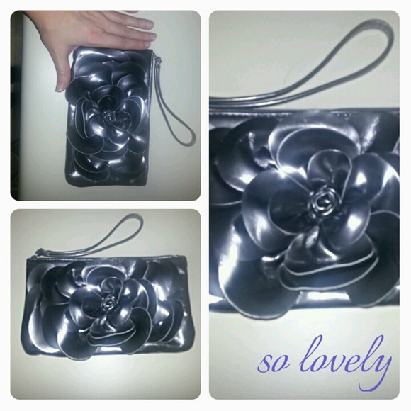 NWOT Silver Clutch w/ Pop Out Flower