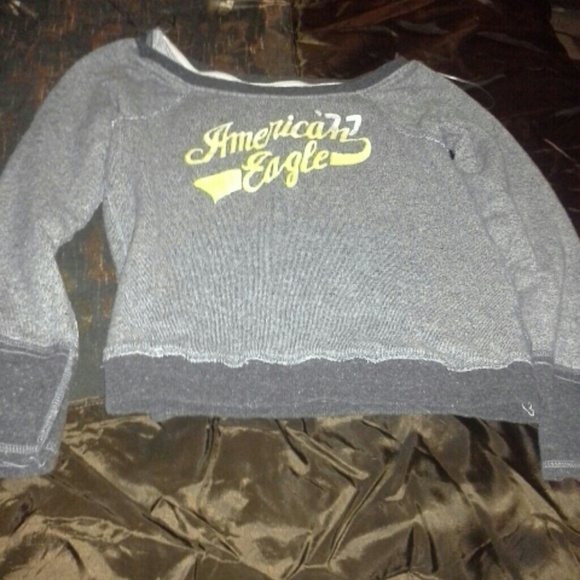 Bundled American eagle sweatshirt and rue 21 skull
