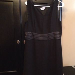 Adorable black sleeveless dress.