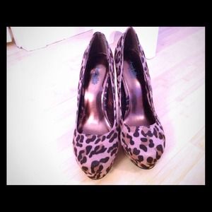 Leopard pumps.