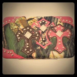 Pink and camo wallet with crosses.