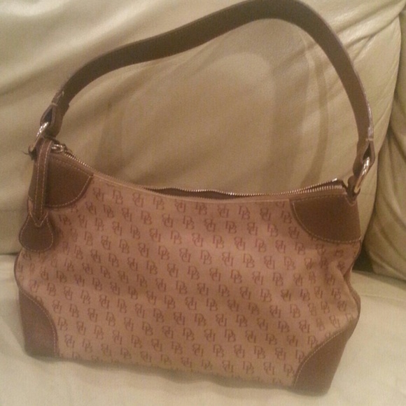 Dooney & Burke, Prada crossover, bowling bag.