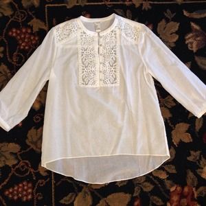 Embroidered white shirt.