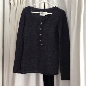 Lightweight wool button up sweater.
