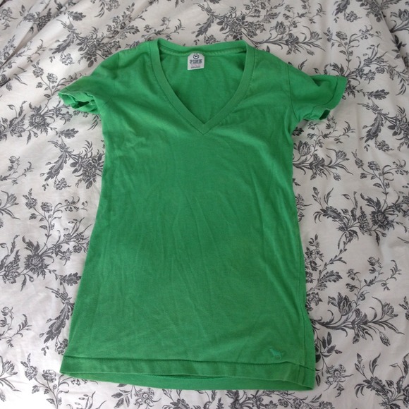 Green v-neck.