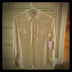 Cute button down collard shirt.