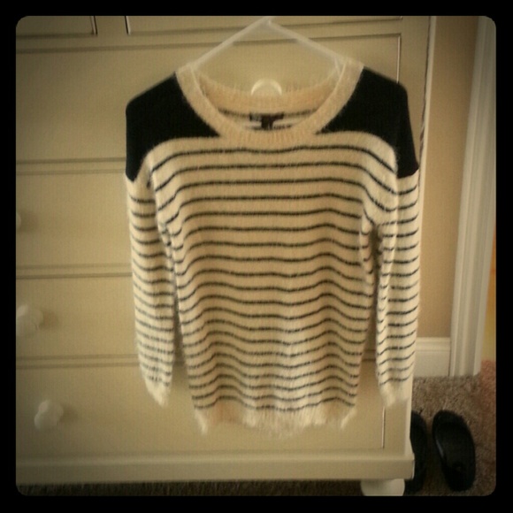 Pretty fuzzy 3/4 sleeve sweater.