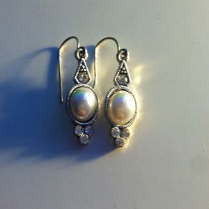 Pearl long earrings.