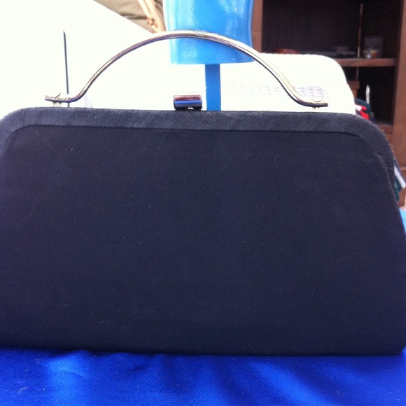 Vintage black clutch.  Single handle.
