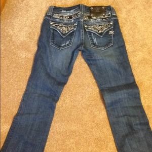 Size 27, Boot cut, Miss Me jeans.