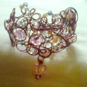 "SOLD" wire wrapped bracelet.
