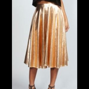 SOLD!!! Mettalic gold faux leather skirt