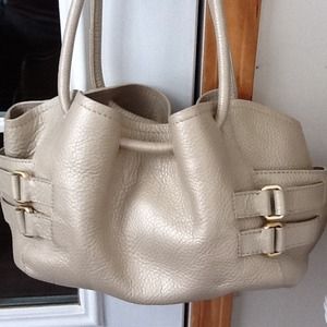 Cole Haan pearlized leather handbag.