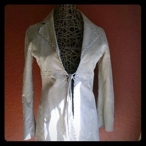 Tan- cream jacket. "WET SEAL"