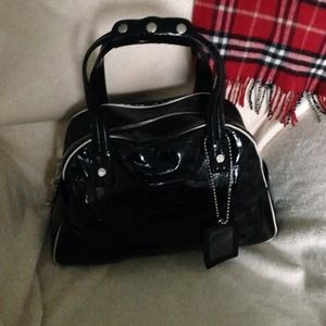 Tod's black patent bowler style handbag