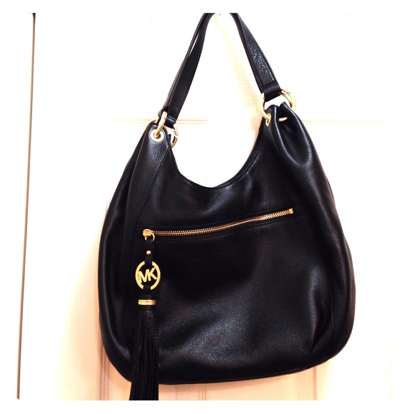 SOLD! Silky soft black leather Michael kors bag!