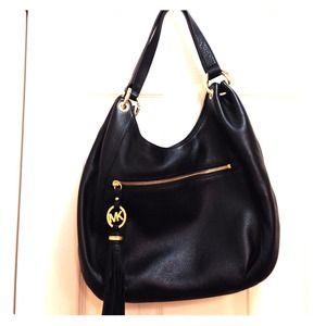 SOLD! Silky soft black leather Michael kors bag!