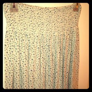 White skirt with blue flowers