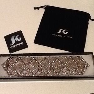 SERGIO GUTIERREZ LIQUID METAL REVERSABLE BRACELET.