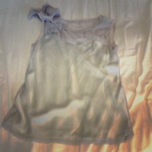 Soft grey silk top with asymmetric embellishment