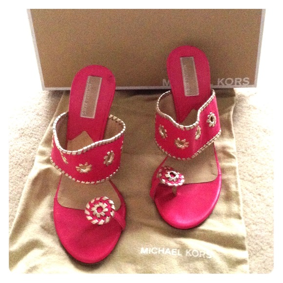 Michael Kors peony color stacked heel sandals.