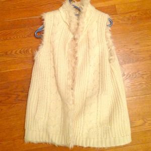 Aqua reversible fur vest