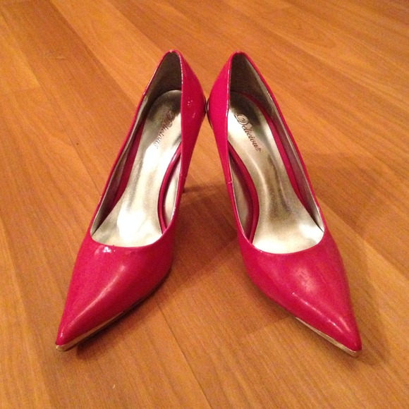 Hot pink pointy toe stilettos with metal accents