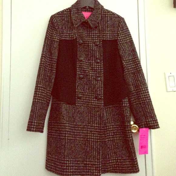 Stay warm and fabulous in this Betsy Johnson  coat