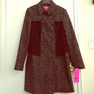 Stay warm and fabulous in this Betsy Johnson  coat
