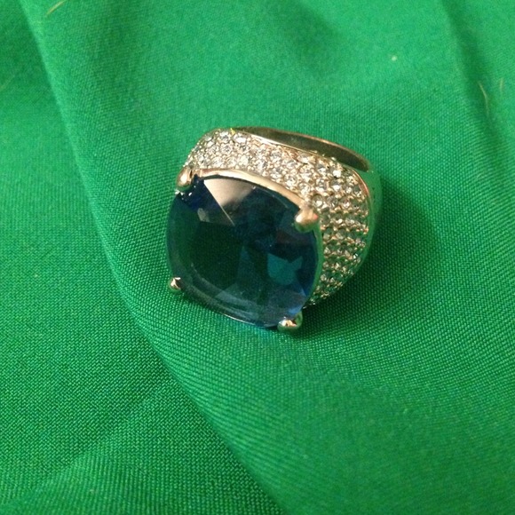 Ring with large blue stone