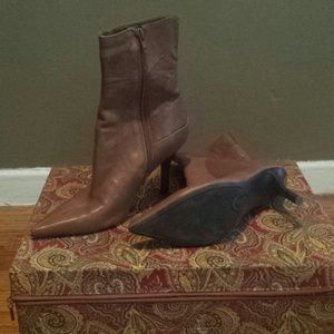 Brown pointy boots